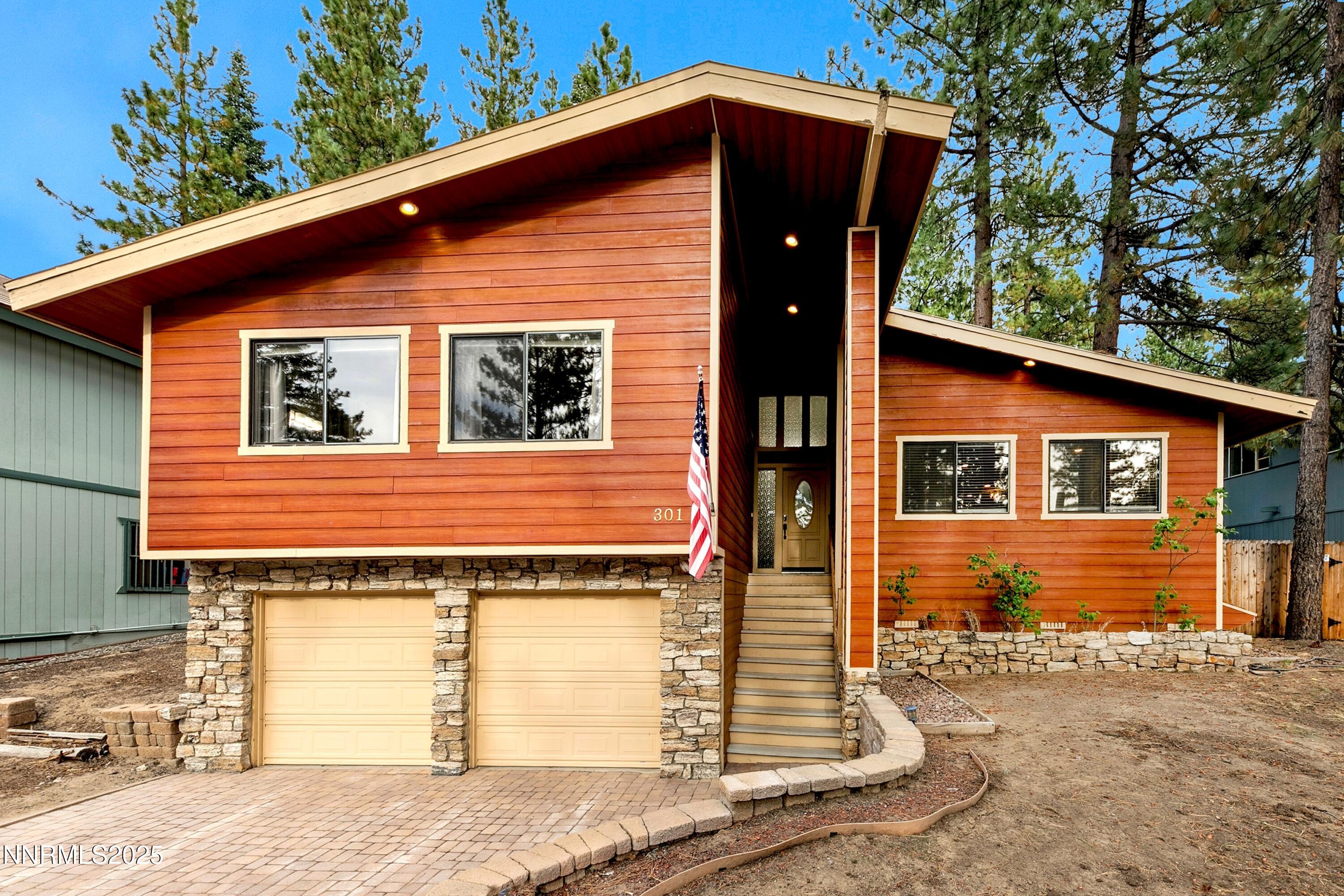 301 Chimney Rock Road Stateline, NV 89449 - Photo 38 of 38 a front view of a house with a yard