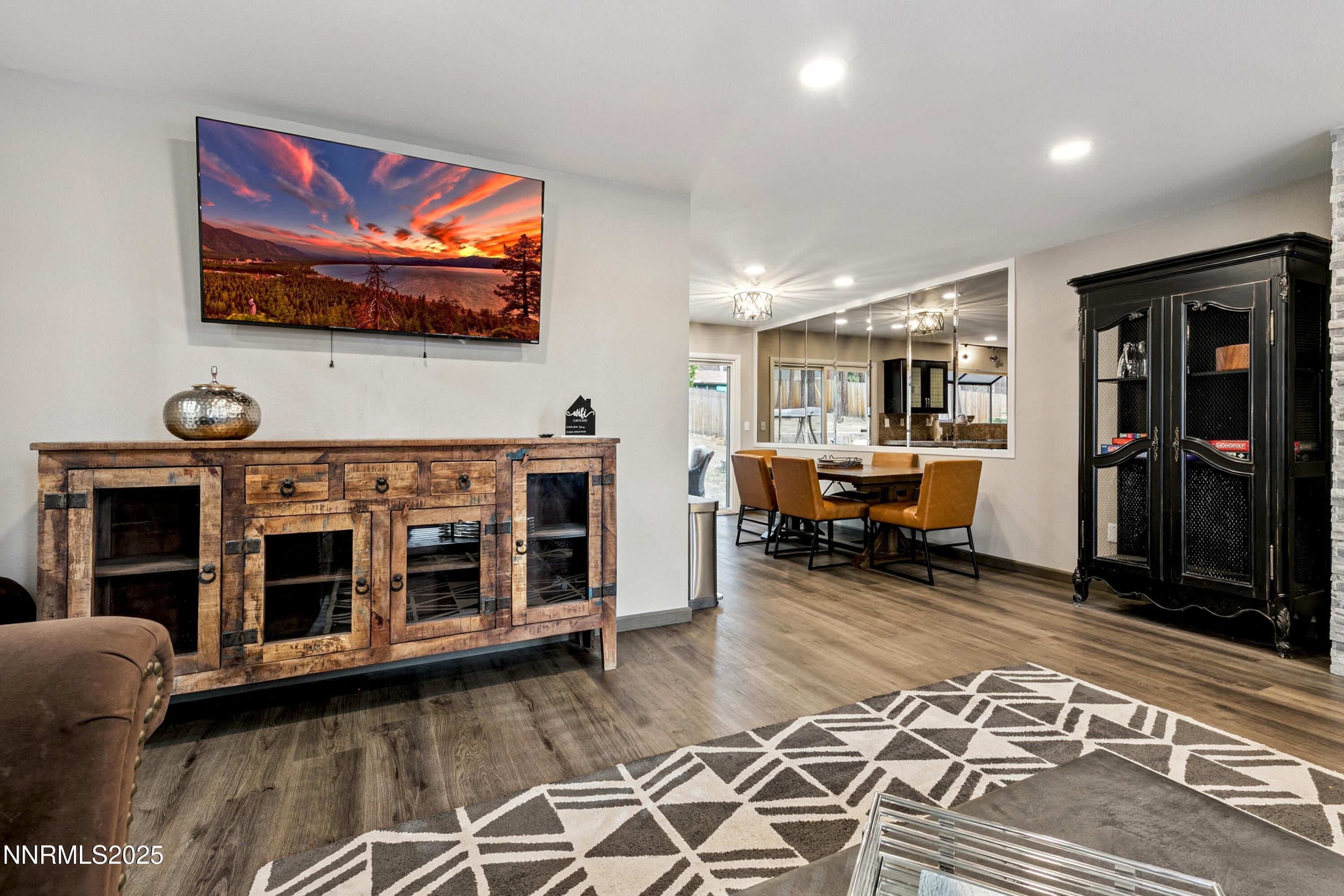301 Chimney Rock Road Stateline, NV 89449 - Photo 4 of 38 a living room with furniture and a flat screen tv
