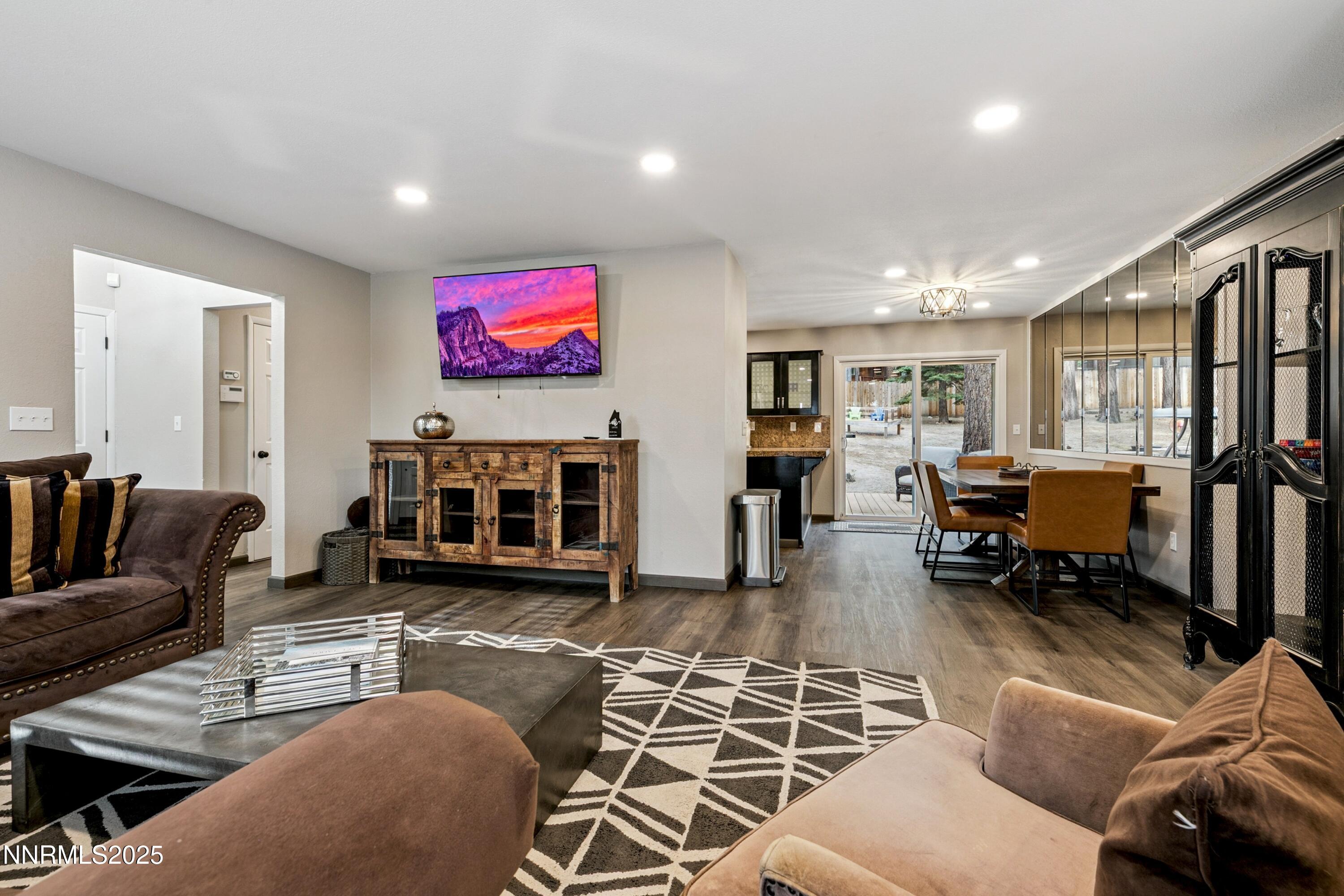 301 Chimney Rock Road Stateline, NV 89449 - Photo 5 of 38 a living room with furniture and a flat screen tv