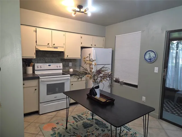 a room with furniture and windows