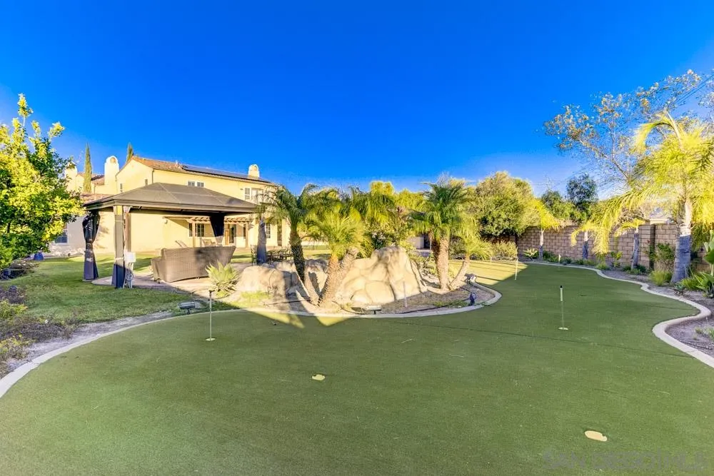 2936 Ranch Gate Road Chula Vista, CA 91914 - Photo 29 of 32 a view of a house with a big yard