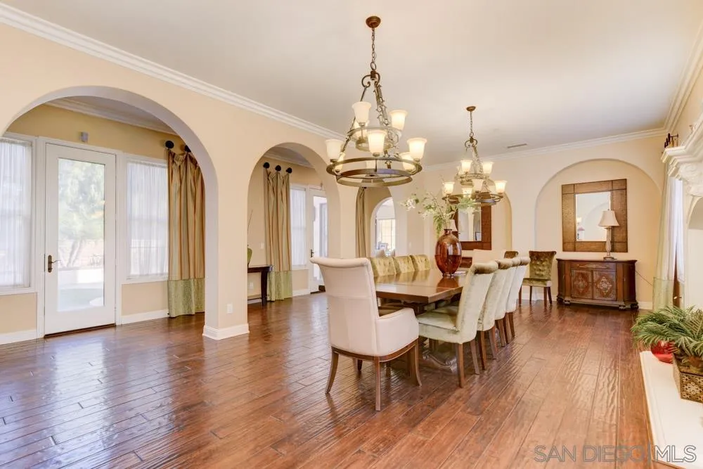 2936 Ranch Gate Road Chula Vista, CA 91914 - Photo 4 of 32 a view of a dining room with furniture window and wooden floor