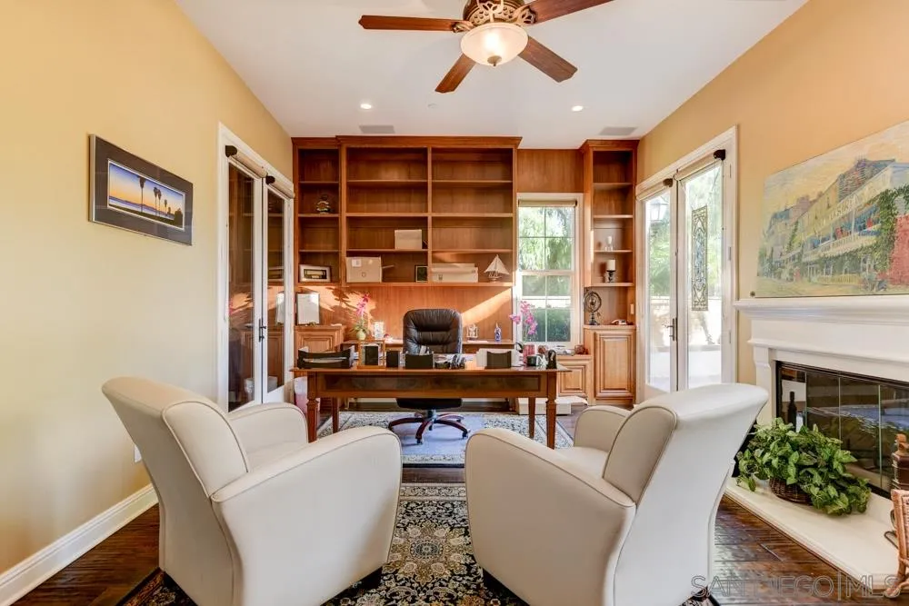 2936 Ranch Gate Road Chula Vista, CA 91914 - Photo 8 of 32 a livingroom with workspace and a couch