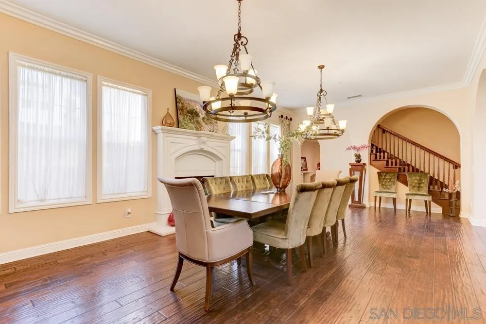 2936 Ranch Gate Road Chula Vista, CA 91914 - Photo 9 of 32 a view of a dining room with furniture window and wooden floor