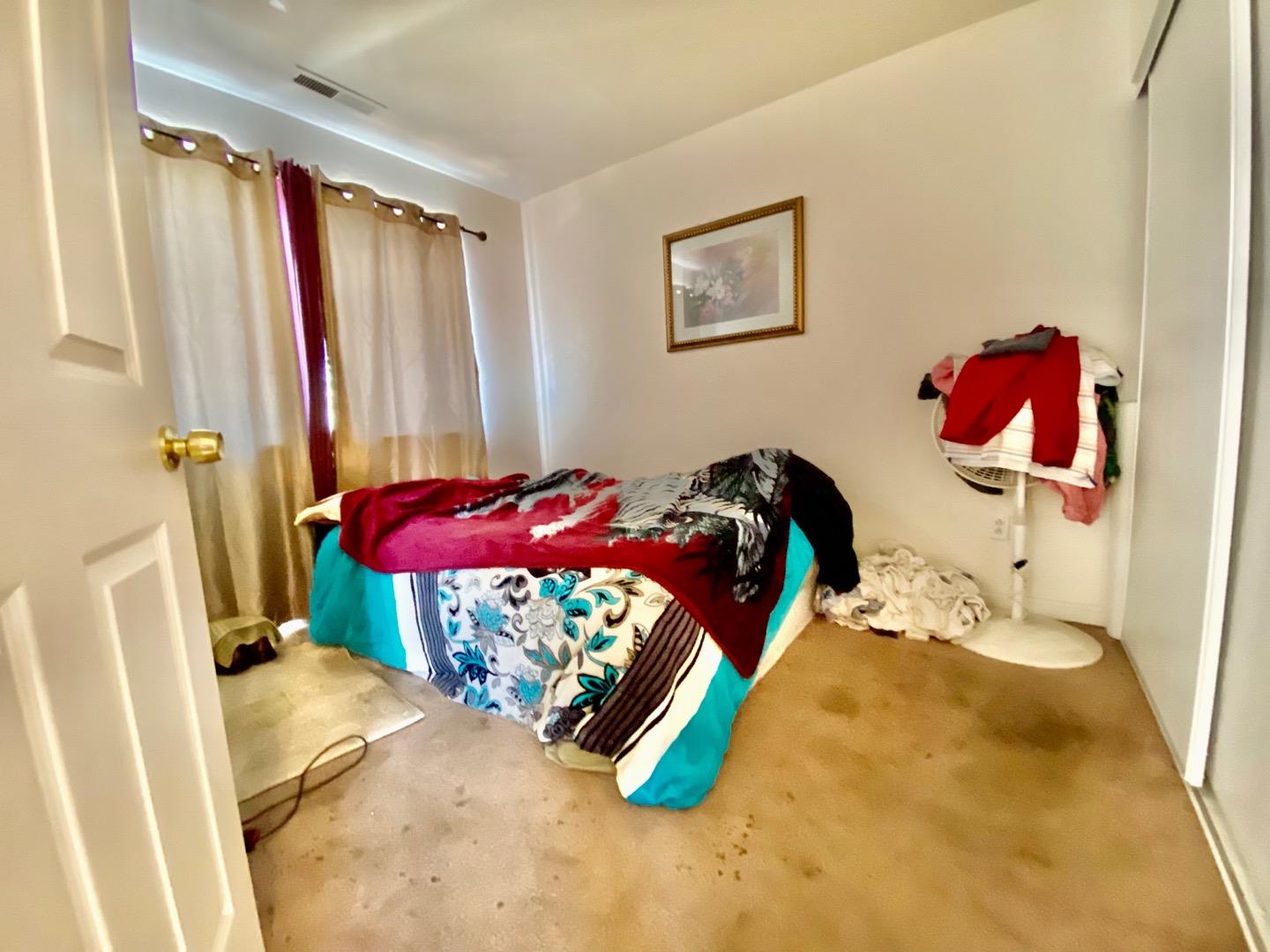 1015 Eagle Drive Salinas, CA 93905 - Photo 6 of 12 a bedroom with a bed and a closet