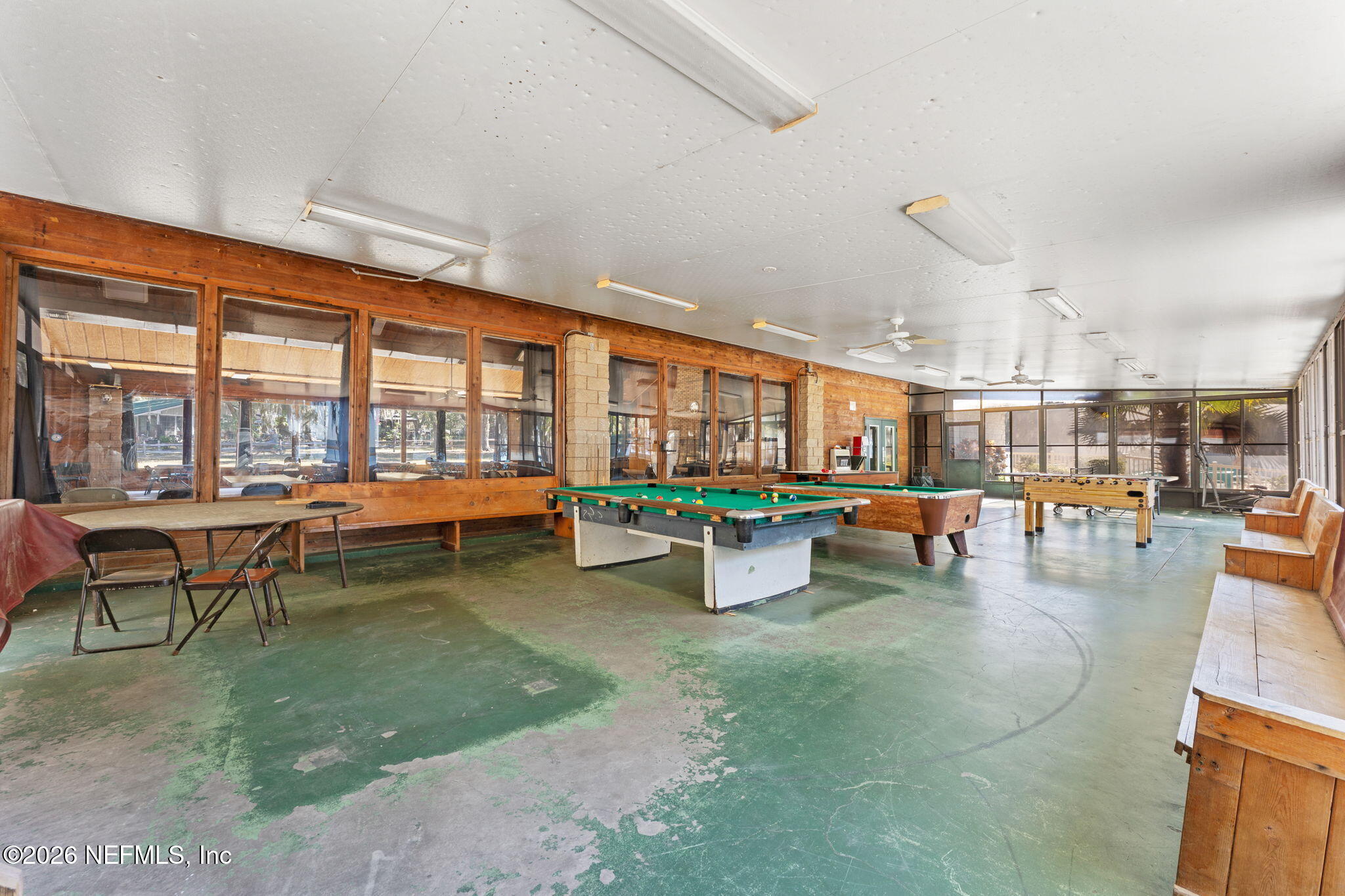 14195 Northeast 252nd Ct Road, Unit 109 Salt Springs, FL 32134 - Photo 19 of 29 lodge exterior covered patio