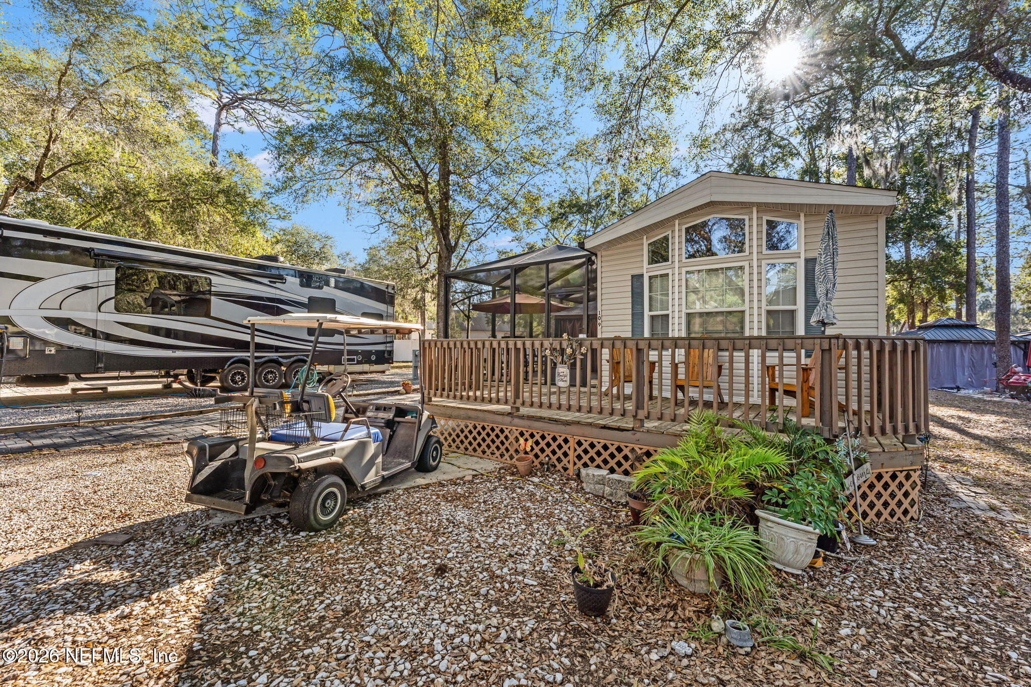 14195 Northeast 252nd Ct Road, Unit 109 Salt Springs, FL 32134 - Photo 3 of 29 frontview right angle