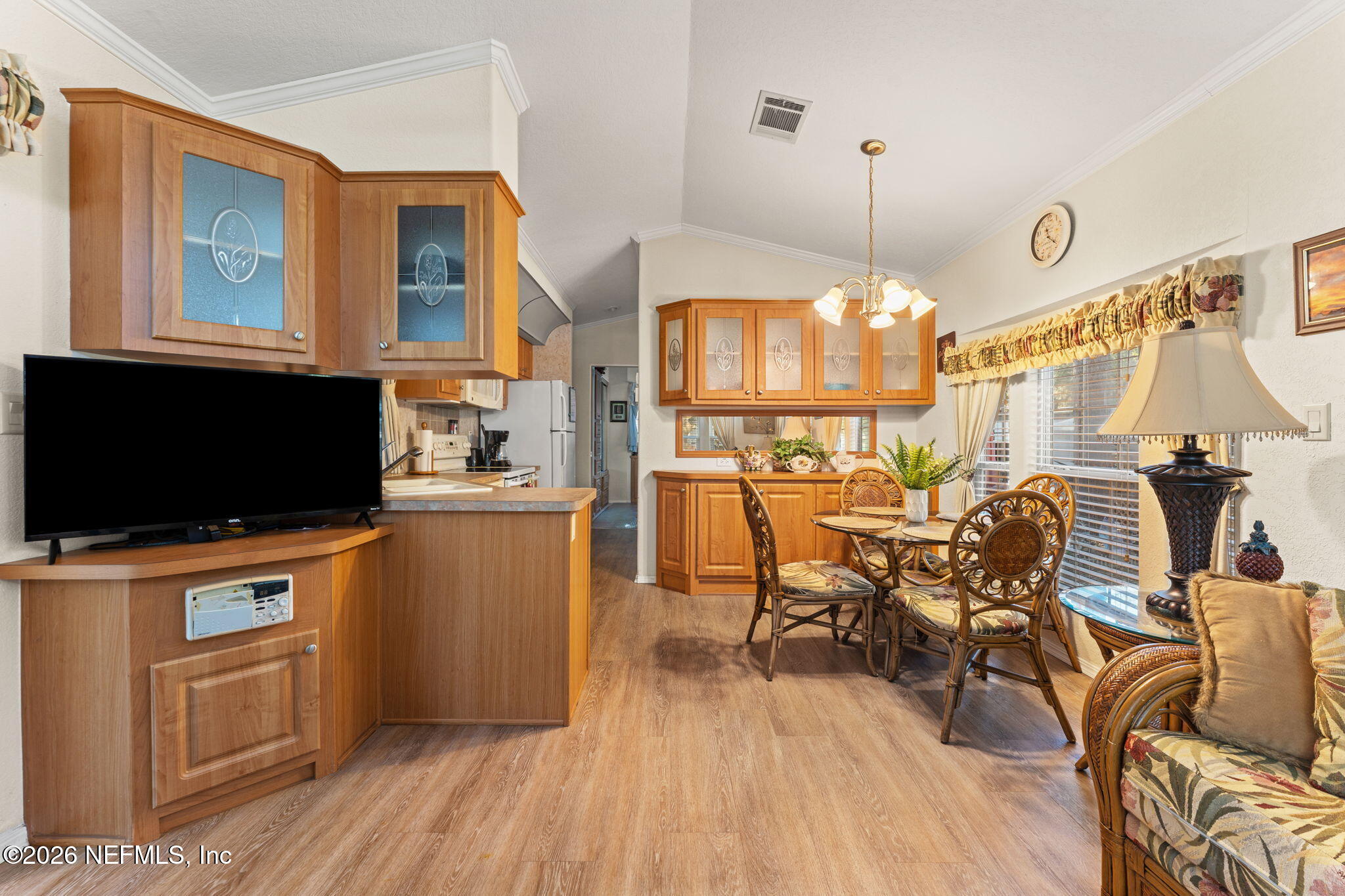 14195 Northeast 252nd Ct Road, Unit 109 Salt Springs, FL 32134 - Photo 7 of 29 dining area view from living space