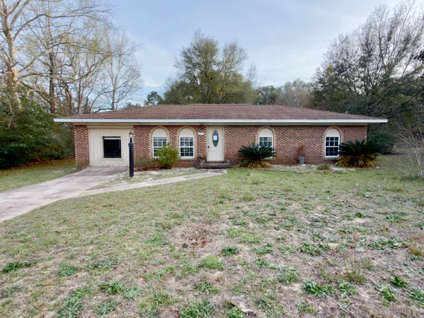 front view of a house with yard
