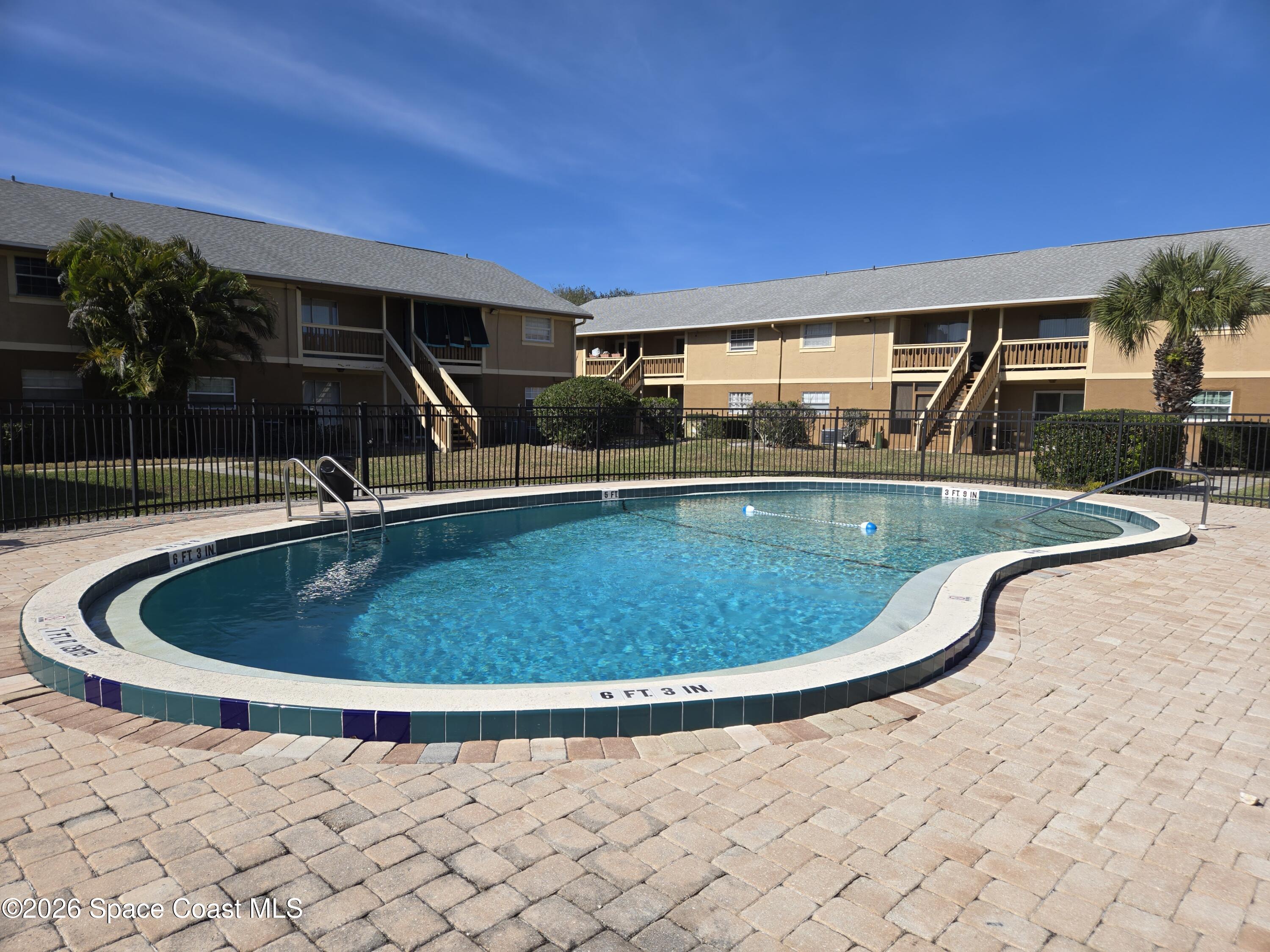 174 Ulster Lane Melbourne, FL 32935 - Photo 24 of 25 a view of outdoor space yard swimming pool and patio