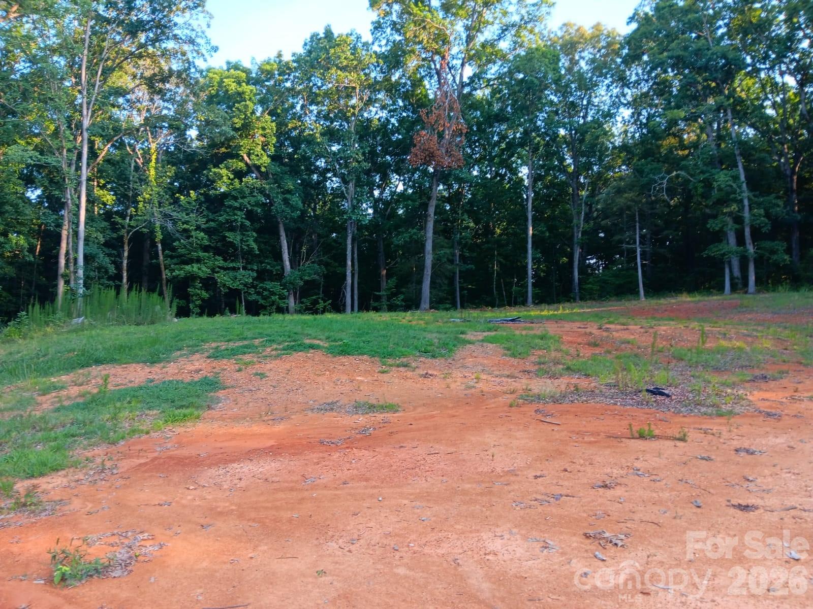 11610 Brief Road, Unit 2 Charlotte, NC 28227 - Photo 7 of 16 a backyard of a house with trampoline