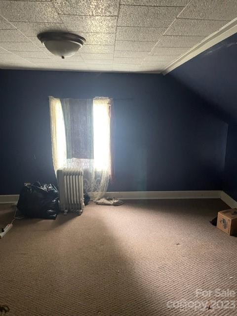 555 Baldwin Avenue Marion, NC 28752 - Photo 8 of 9 a view of an empty room and window