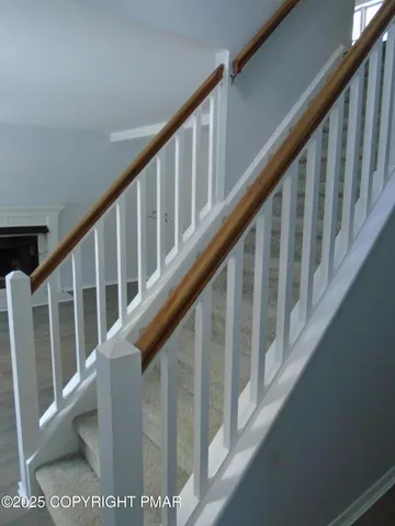 a bathroom with a sink mirror and vanity