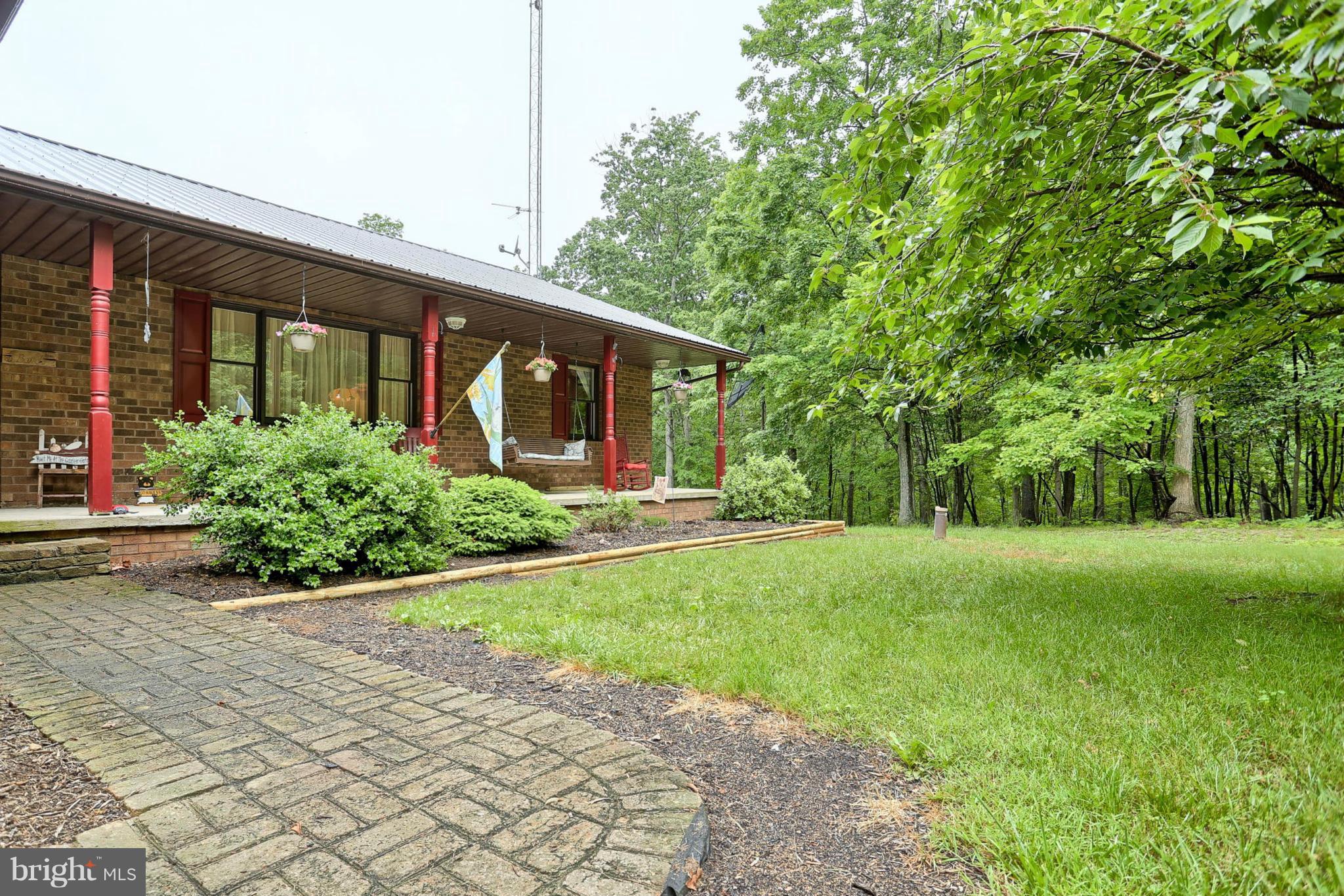 10852 Garrison Hollow Road Clear Spring, MD 21722 - Photo 2 of 30 a front view of house with yard and green space