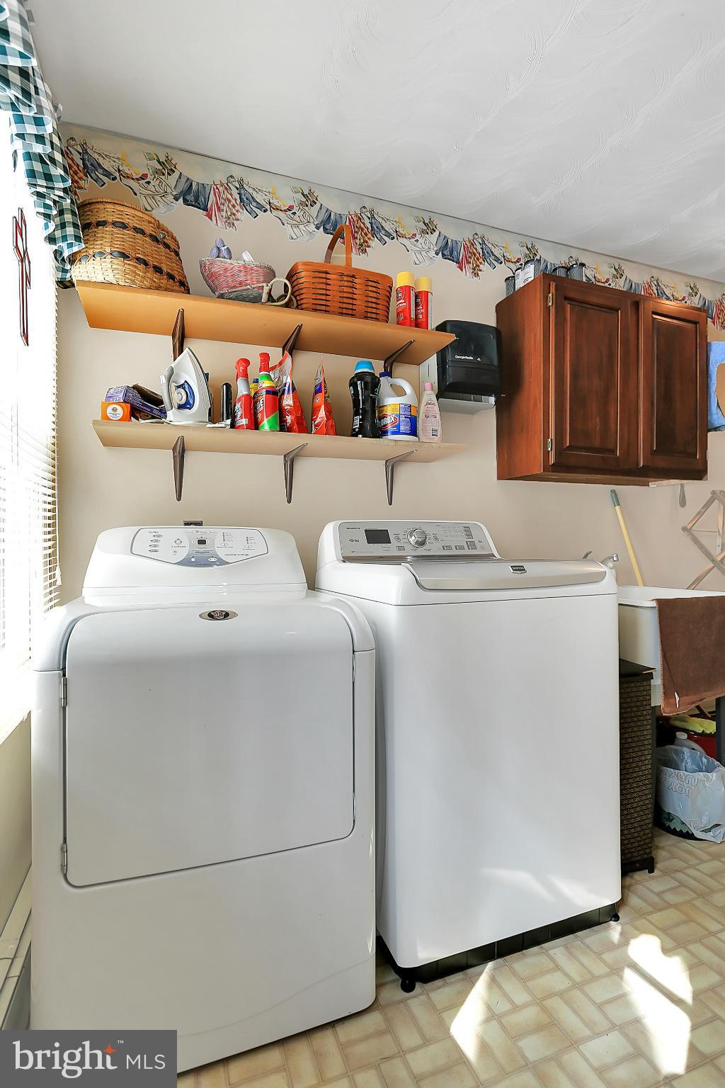 10852 Garrison Hollow Road Clear Spring, MD 21722 - Photo 20 of 30 a utility room with dryer and washer
