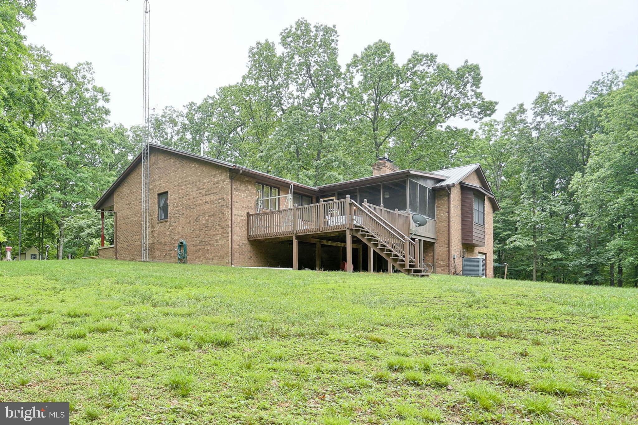 10852 Garrison Hollow Road Clear Spring, MD 21722 - Photo 3 of 30 a view of a house with a yard