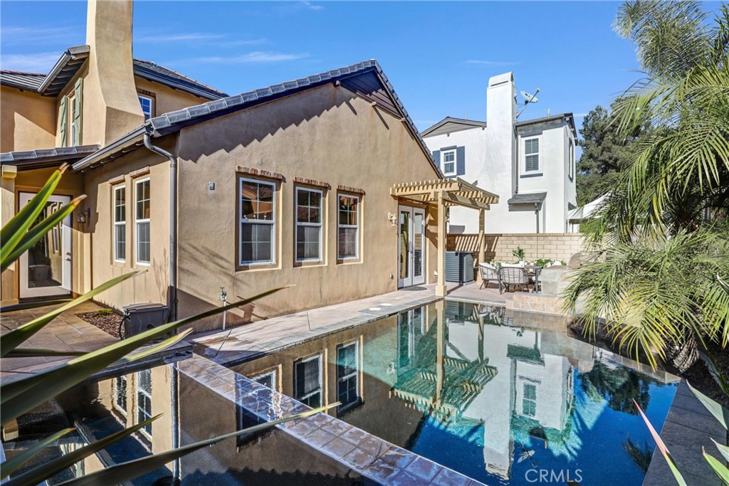 8 Ingleside Irvine, CA 92620 - Photo 45 of 74 a view of a house with pool and sitting area