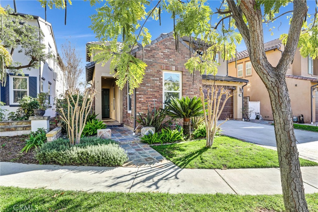 8 Ingleside Irvine, CA 92620 - Photo 5 of 74 a front view of a house with garden