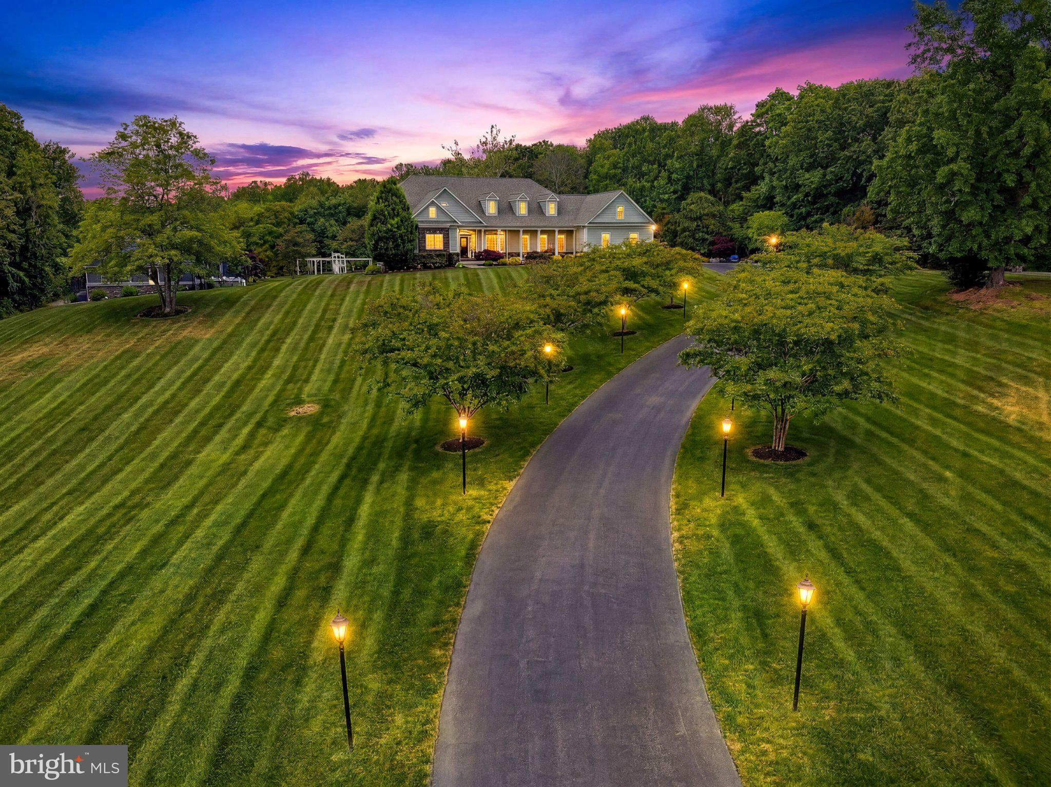 Serene sunset over a charming estate.