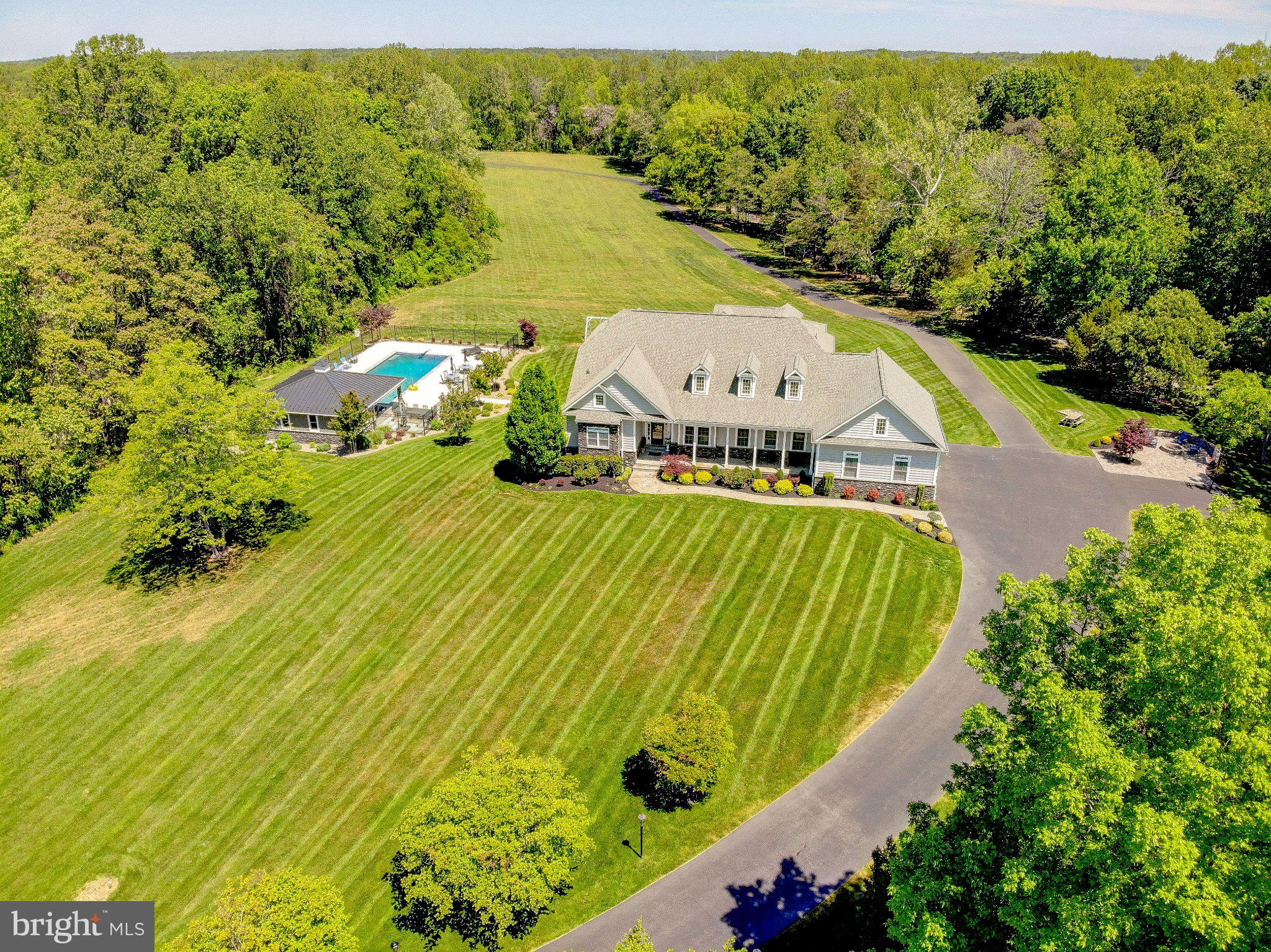 2393 Garrity Road St. Leonard, MD 20685 - Photo 14 of 14 Sprawling estate with lush greenery.