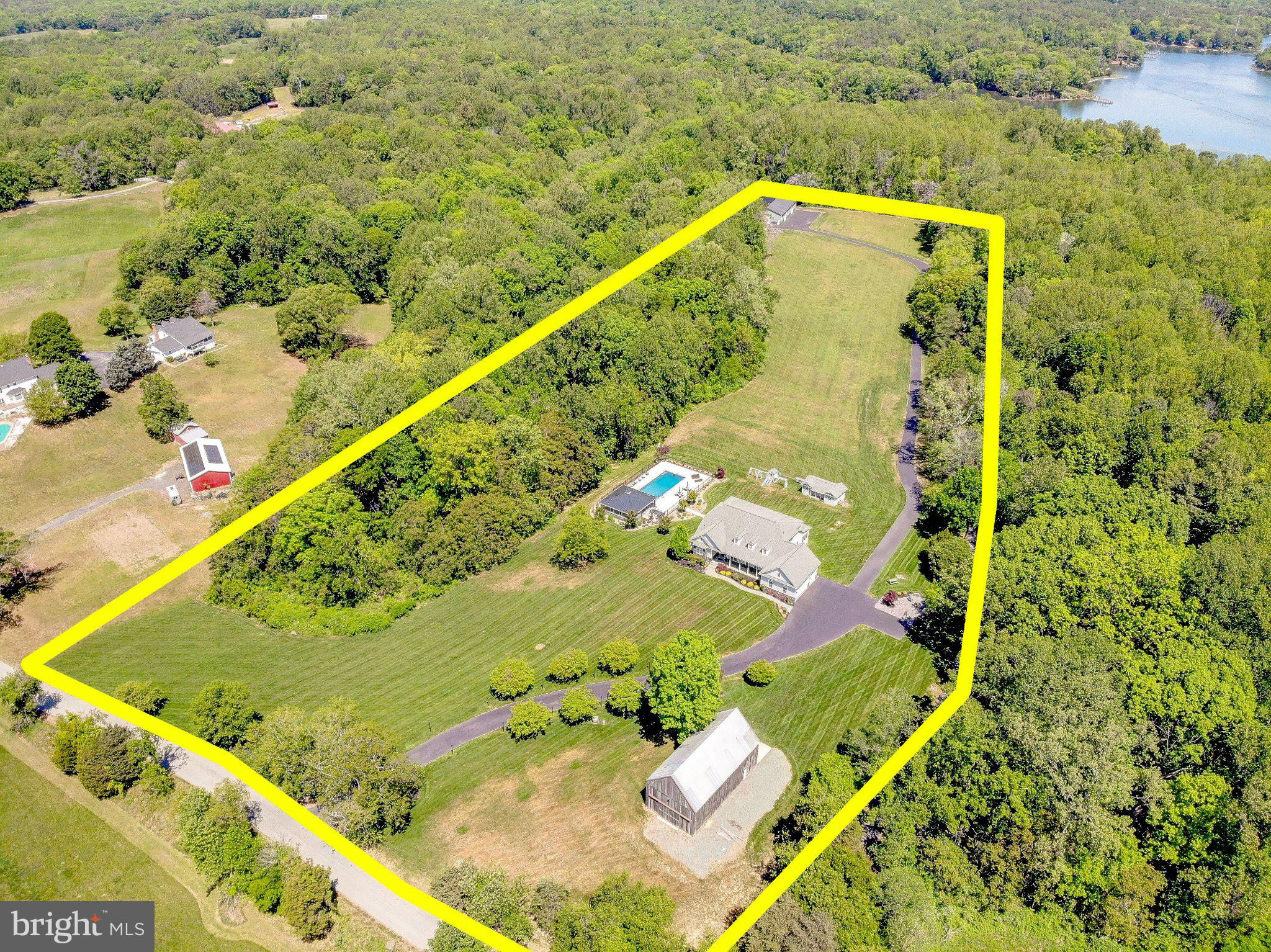 2393 Garrity Road St. Leonard, MD 20685 - Photo 8 of 14 Sprawling estate with lush greenery.