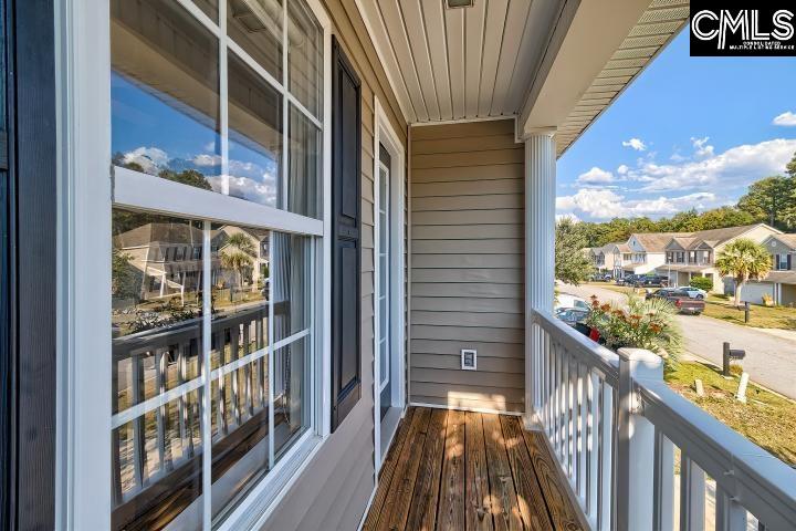 209 Eagle Pointe Drive Chapin, SC 29036 - Photo 35 of 40 a view of a balcony with wooden floor