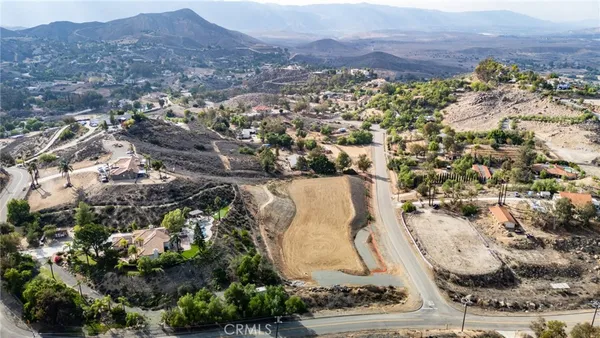 an aerial view of residential house with outdoor space