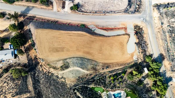 a view of a fireplace in a backyard