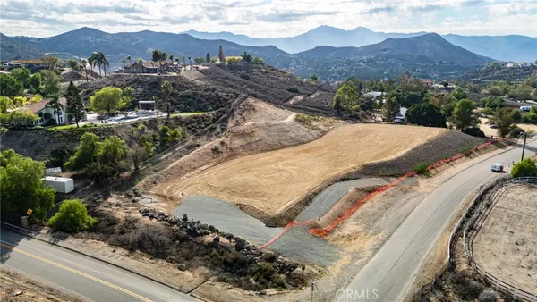 a view of a house with a mountain