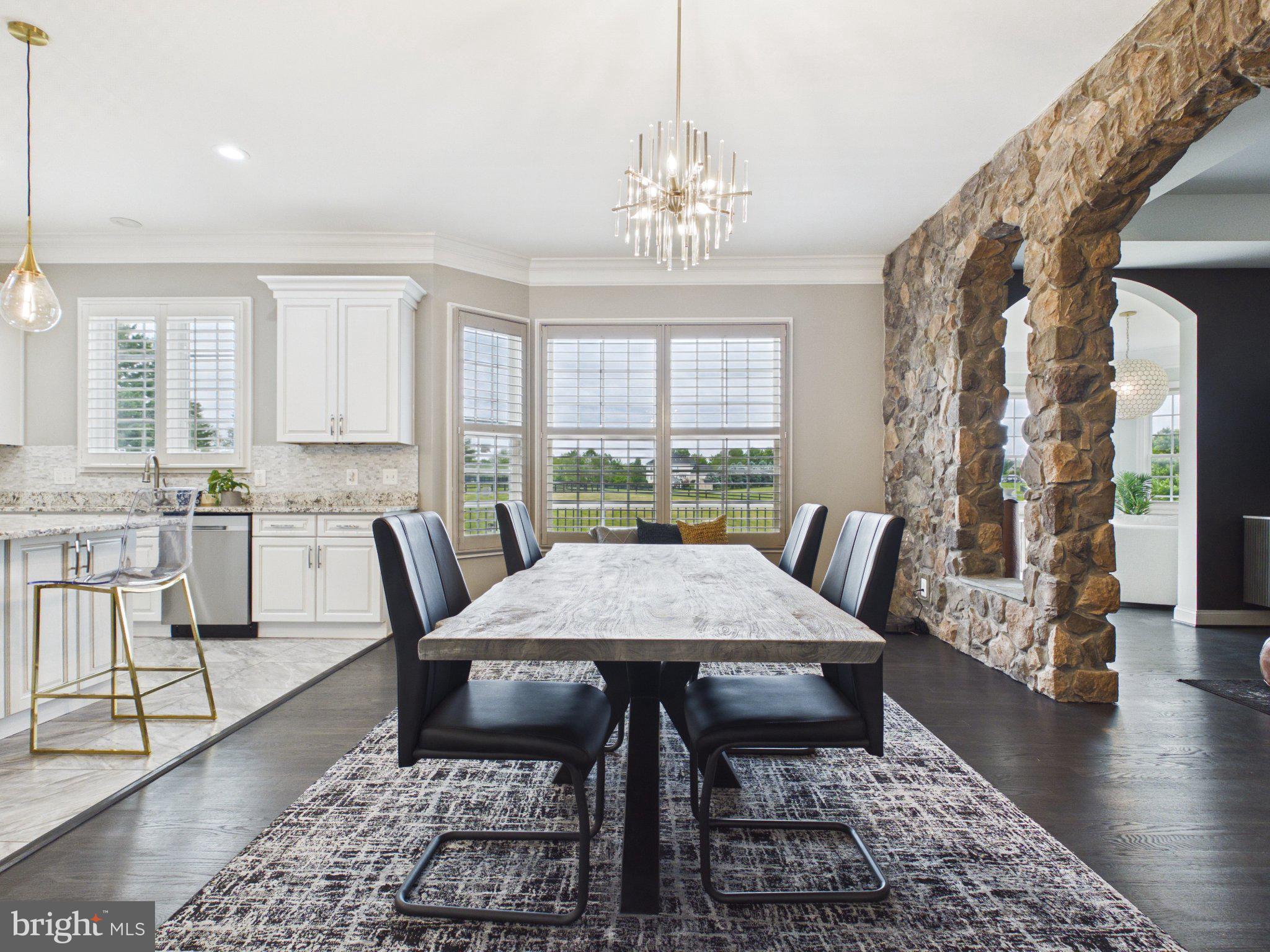 38565 Piggott Bottom Road Hamilton, VA 20158 - Photo 12 of 85 a view of a dining room with furniture window and wooden floor