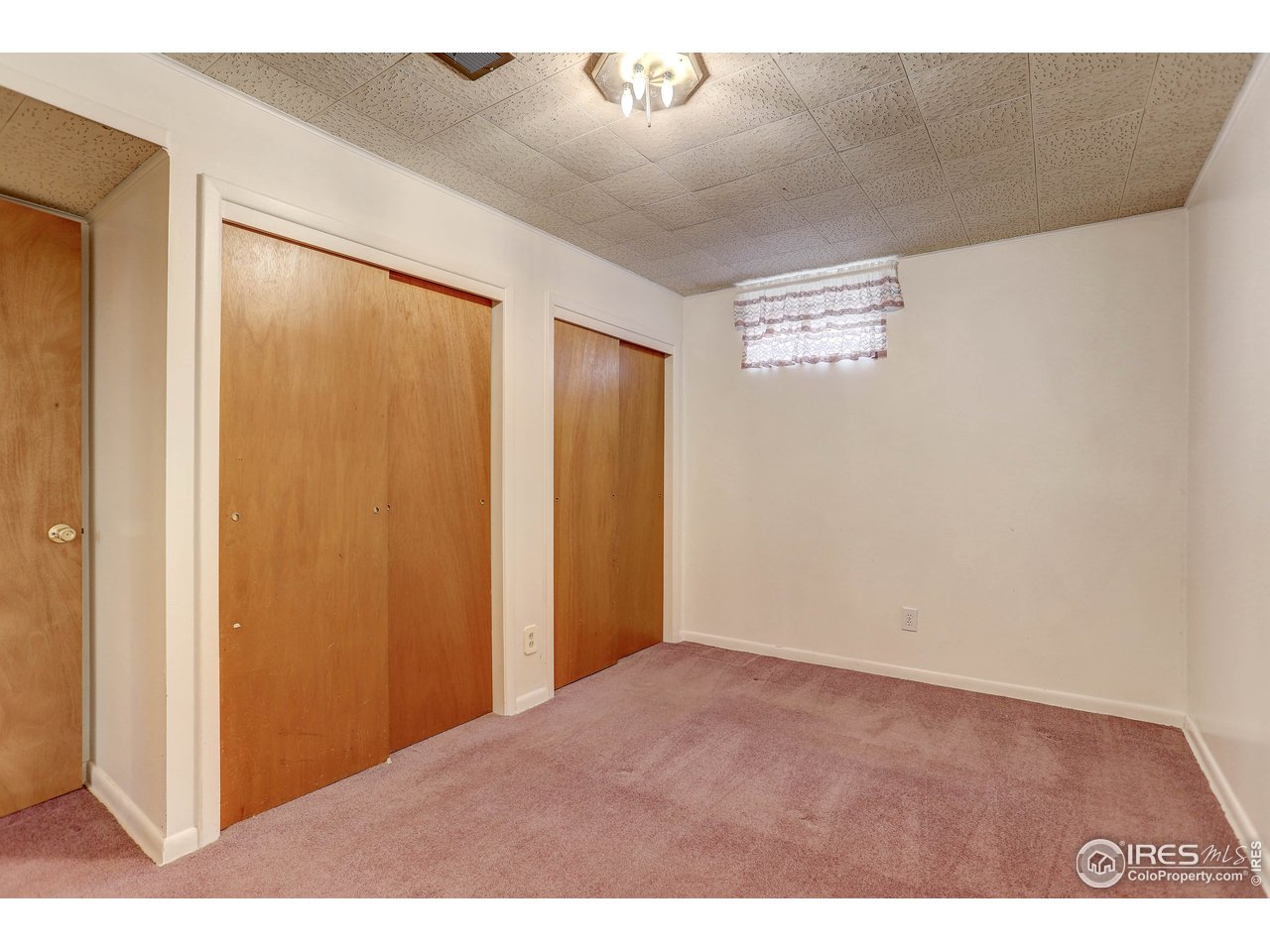 7100 Raritan Street Denver, CO 80221 - Photo 11 of 24 2nd. Non-conforming Bedroom