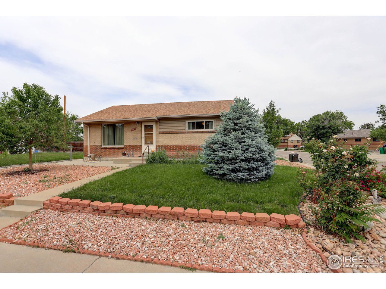 7100 Raritan Street Denver, CO 80221 - Photo 13 of 24 Front view large lot for yard.