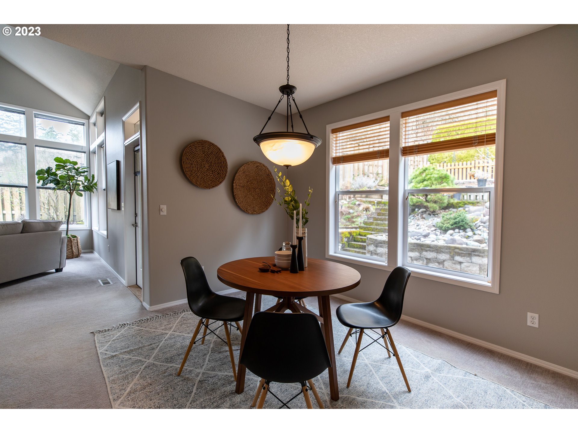 2399 Southwest Border Way Gresham, OR 97080 - Photo 16 of 48 a dining room with furniture and window