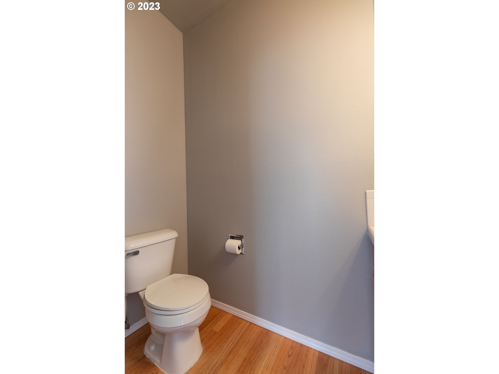 2399 Southwest Border Way Gresham, OR 97080 - Photo 18 of 48 a bathroom with a toilet and a vanity