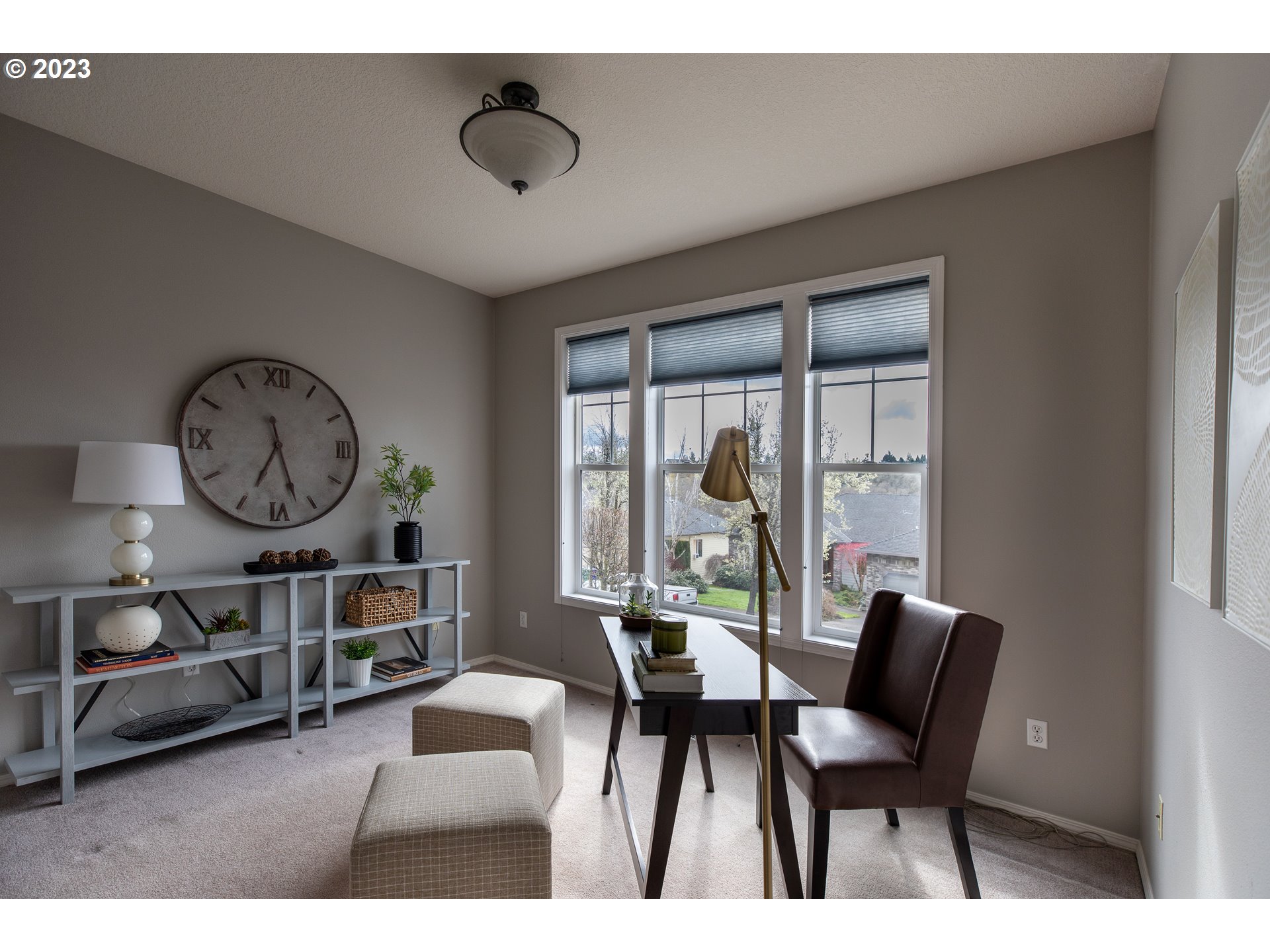 2399 Southwest Border Way Gresham, OR 97080 - Photo 21 of 48 a view of a dining room with furniture window and wooden floor