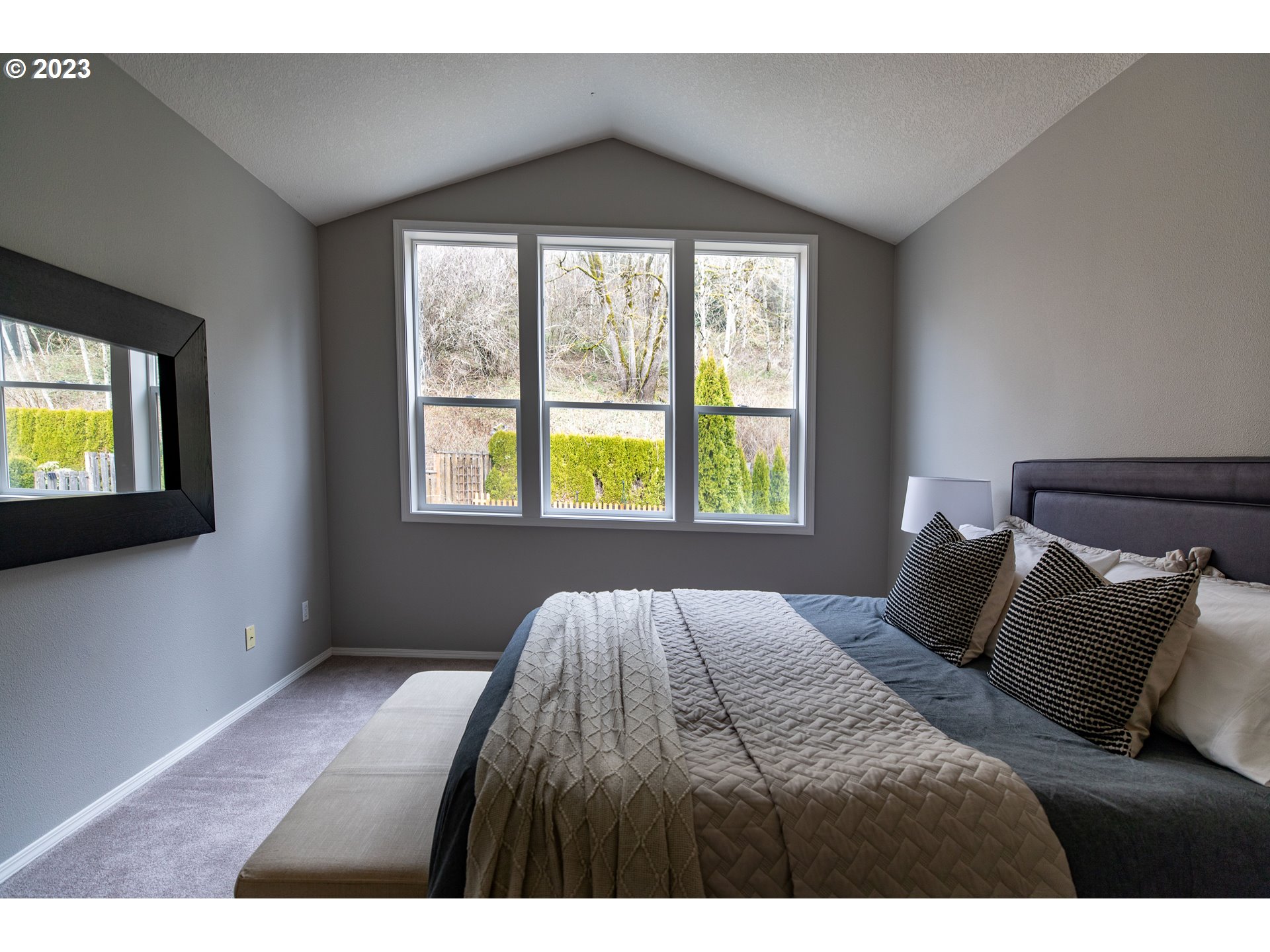2399 Southwest Border Way Gresham, OR 97080 - Photo 29 of 48 a bedroom with a bed and a window