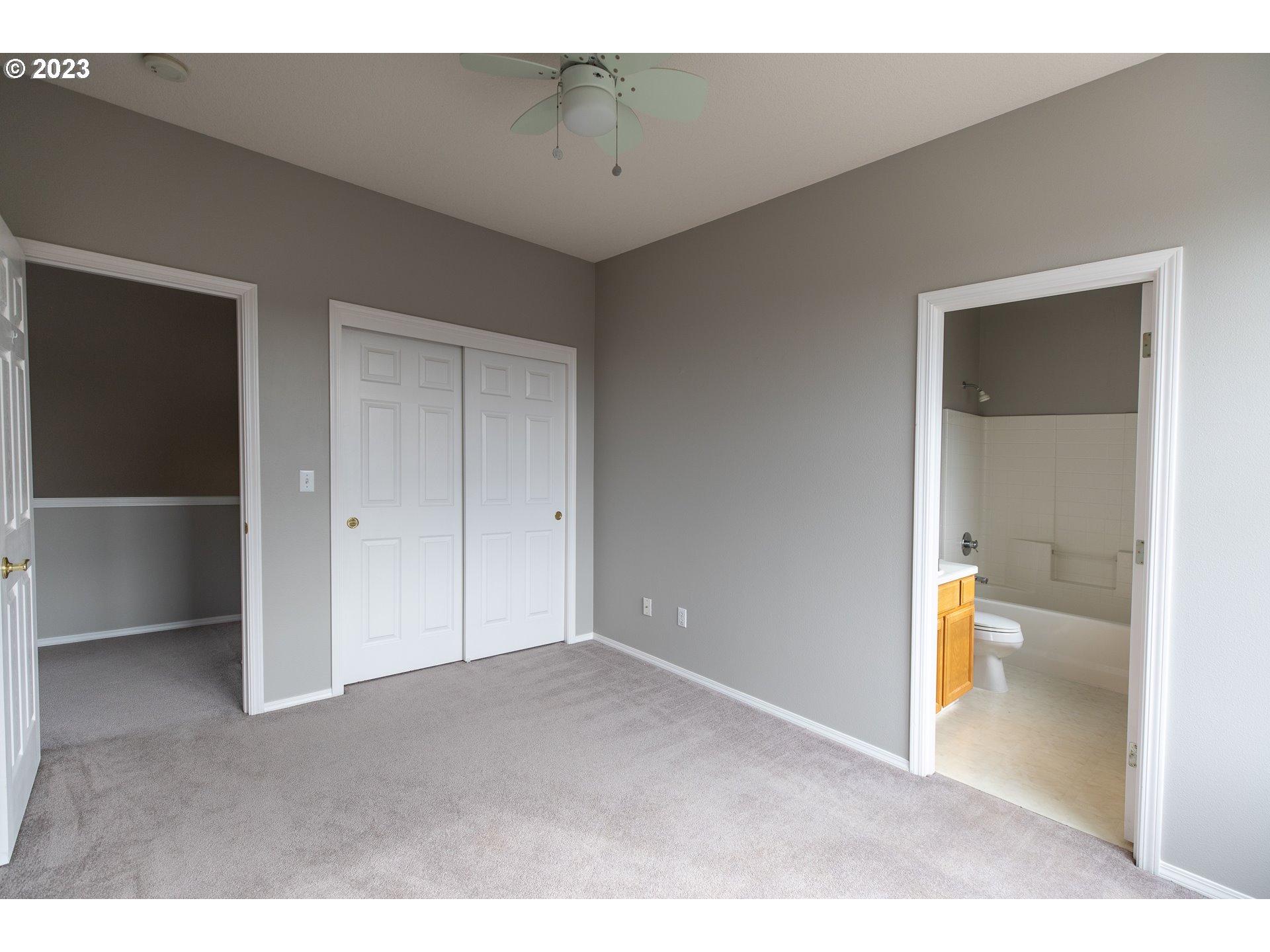 2399 Southwest Border Way Gresham, OR 97080 - Photo 34 of 48 a big room with closet and wooden floor