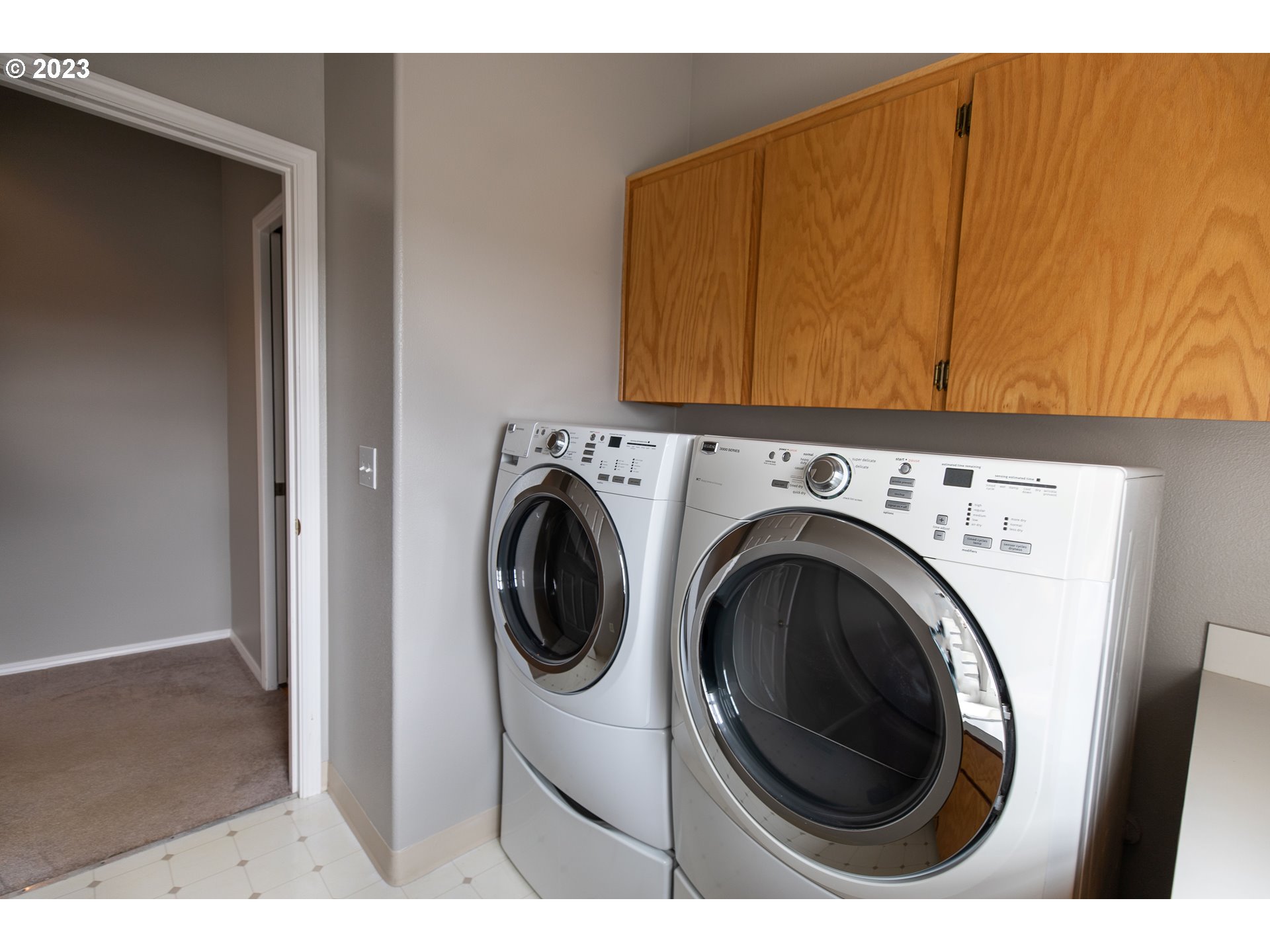 2399 Southwest Border Way Gresham, OR 97080 - Photo 38 of 48 a view of a utility room with dryer and washer