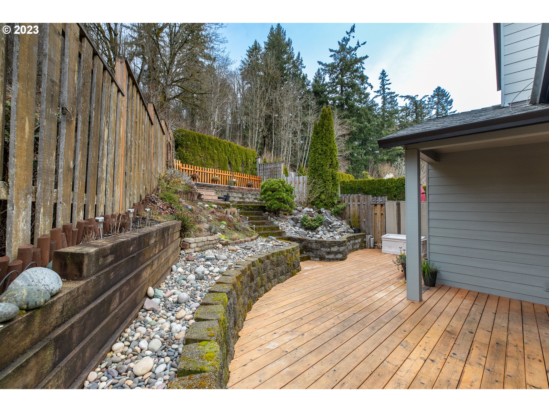 2399 Southwest Border Way Gresham, OR 97080 - Photo 43 of 48 a view of a backyard with sitting area