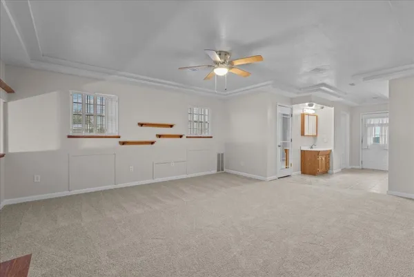 a room with gym equipment and racks