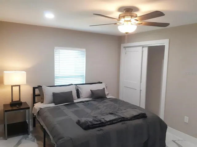 a view of a bathroom from a hallway
