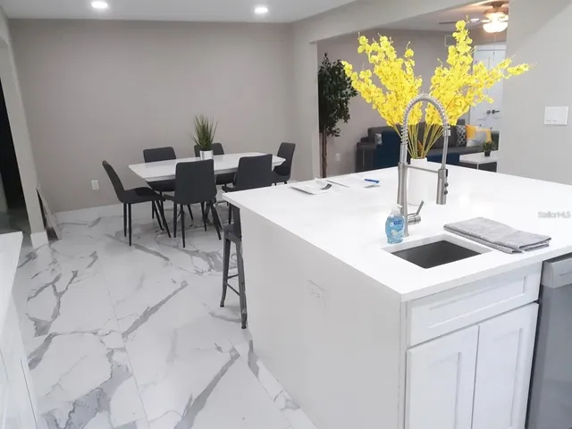 a view of backyard with green space