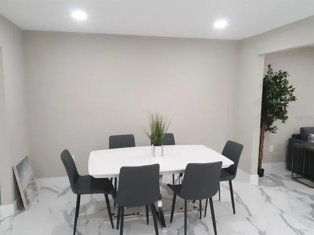 a front view of house with yard and entertaining space