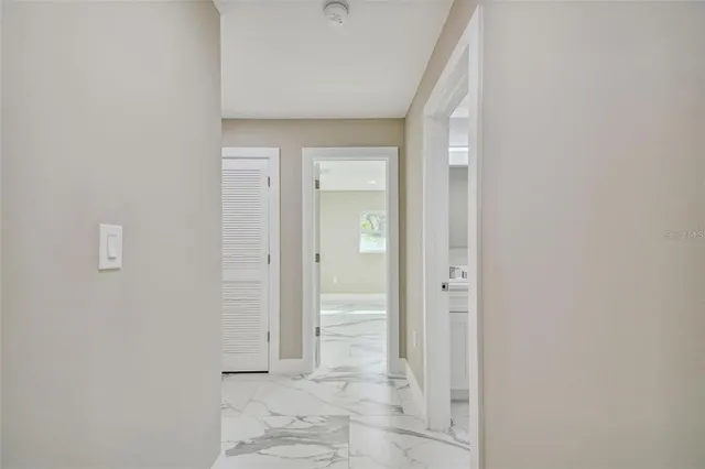 a view of a house with backyard and porch