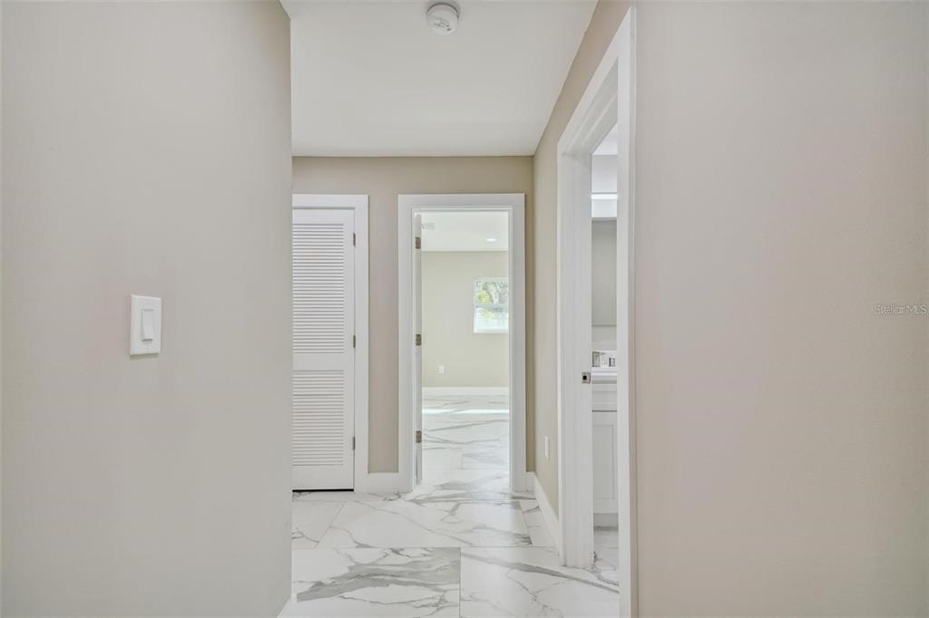 2042 Craft Lane Sarasota, FL 34239 - Photo 24 of 100 a view of a bathroom from a hallway