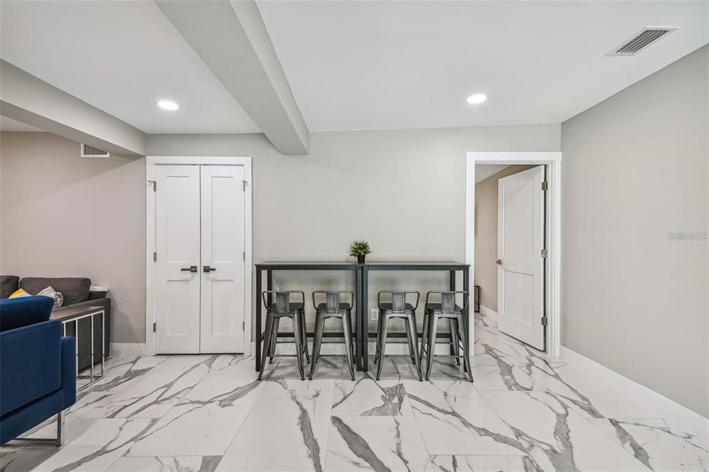 2042 Craft Lane Sarasota, FL 34239 - Photo 80 of 100 a view of a livingroom with furniture and staircase