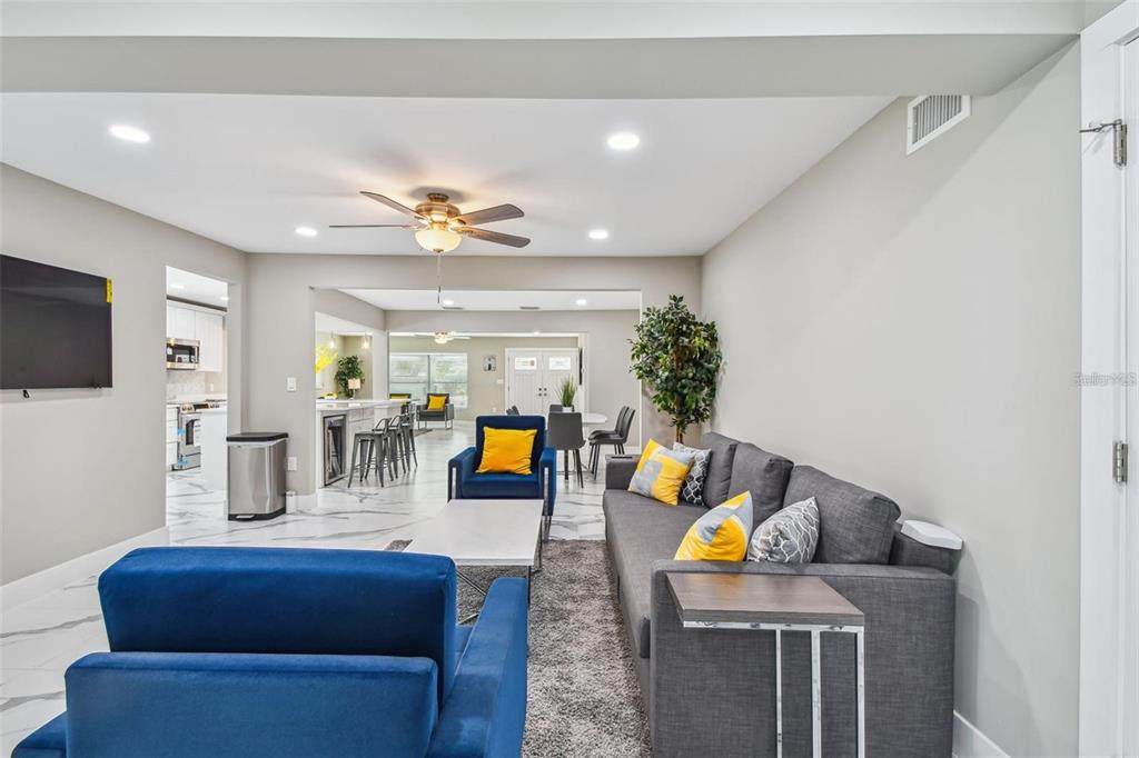 2042 Craft Lane Sarasota, FL 34239 - Photo 82 of 100 a living room with furniture and a flat screen tv