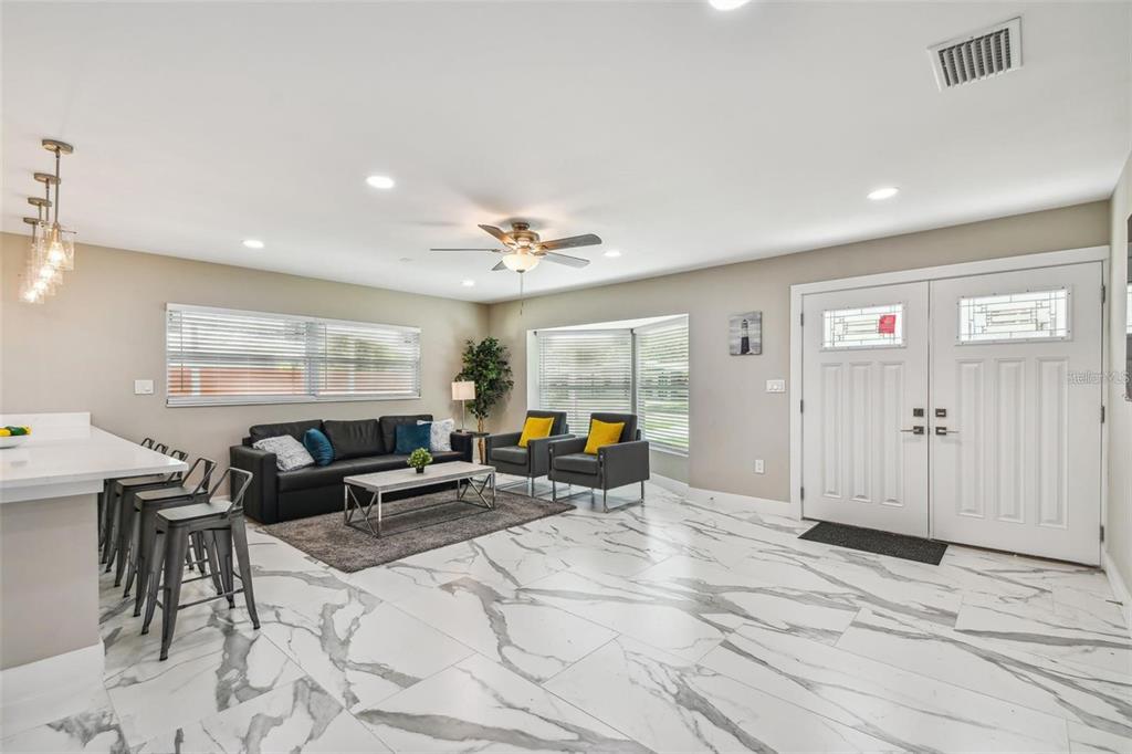 2042 Craft Lane Sarasota, FL 34239 - Photo 88 of 100 a living room with furniture and wooden floor