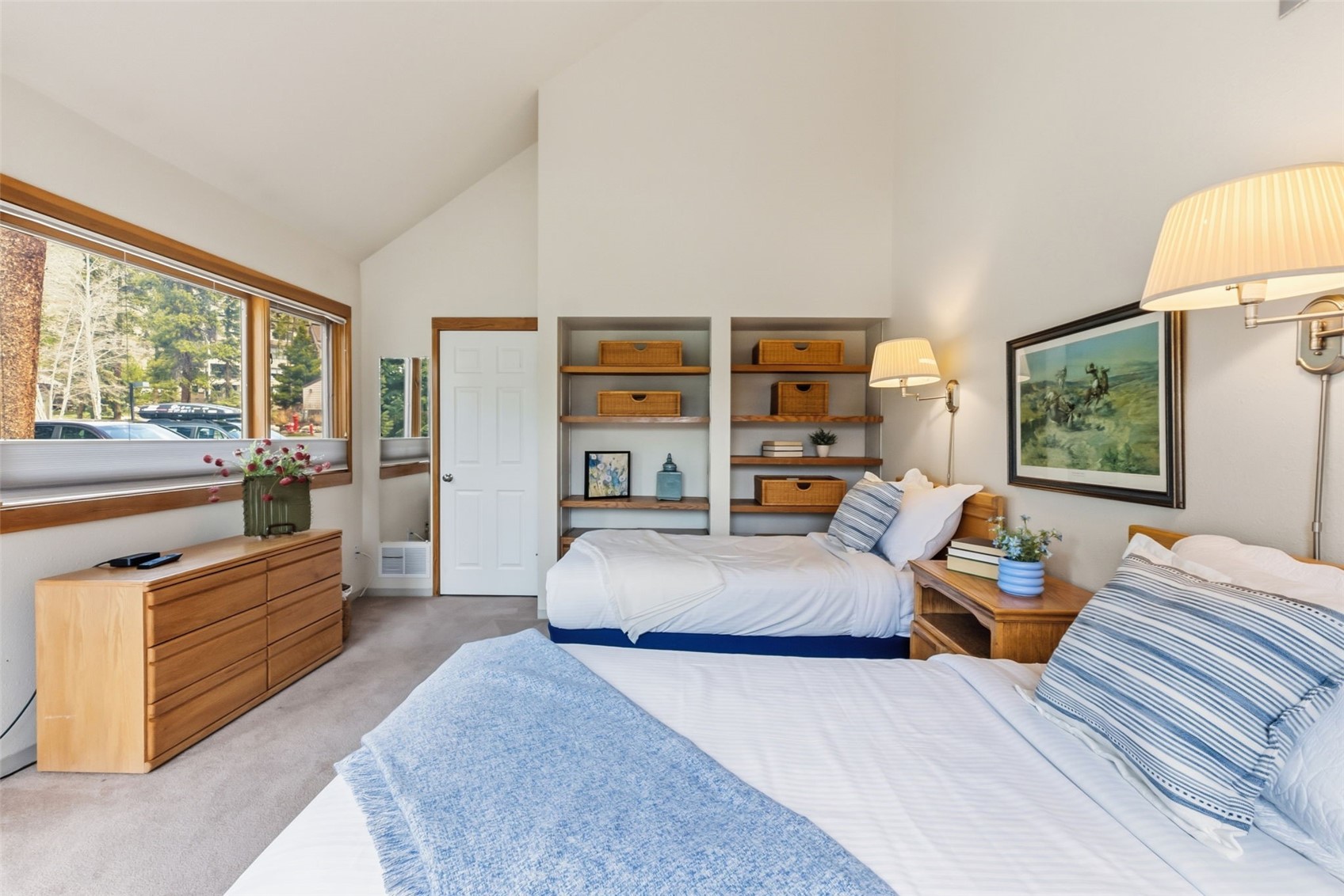 30 Tennis Club Road, Unit 1608 Keystone, CO 80435 - Photo 21 of 29 a bedroom with furniture and large windows