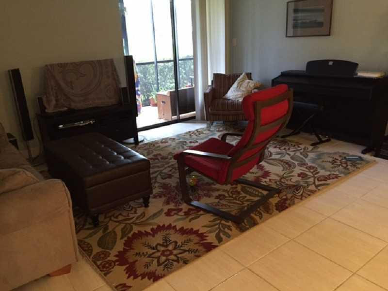 9749 West McNab Road, Unit 111 Tamarac, FL 33321 - Photo 3 of 10 Living Room.